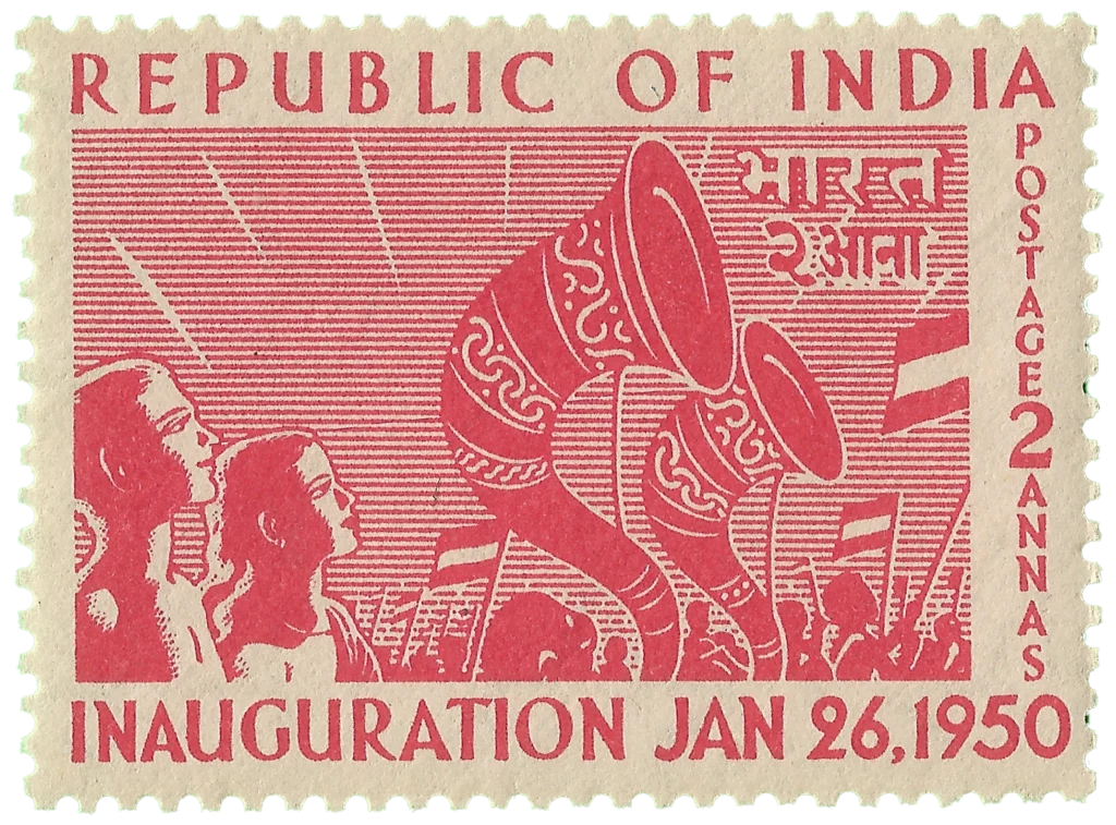 Indian postage stamp featuring rejoicing crowds
